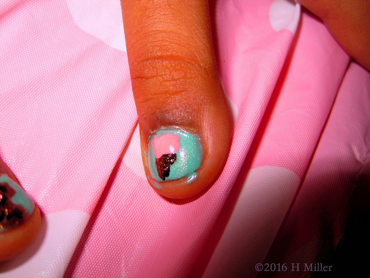 She Has An Ice Cream Cone Nail Design On Her Nail! 