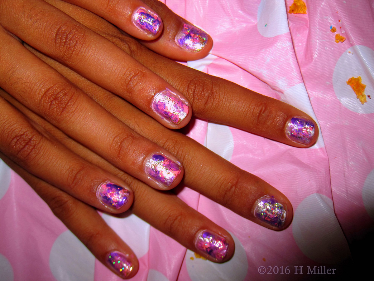 Shiny Pink Home Mini Manicure With Marbled Nail Design. 