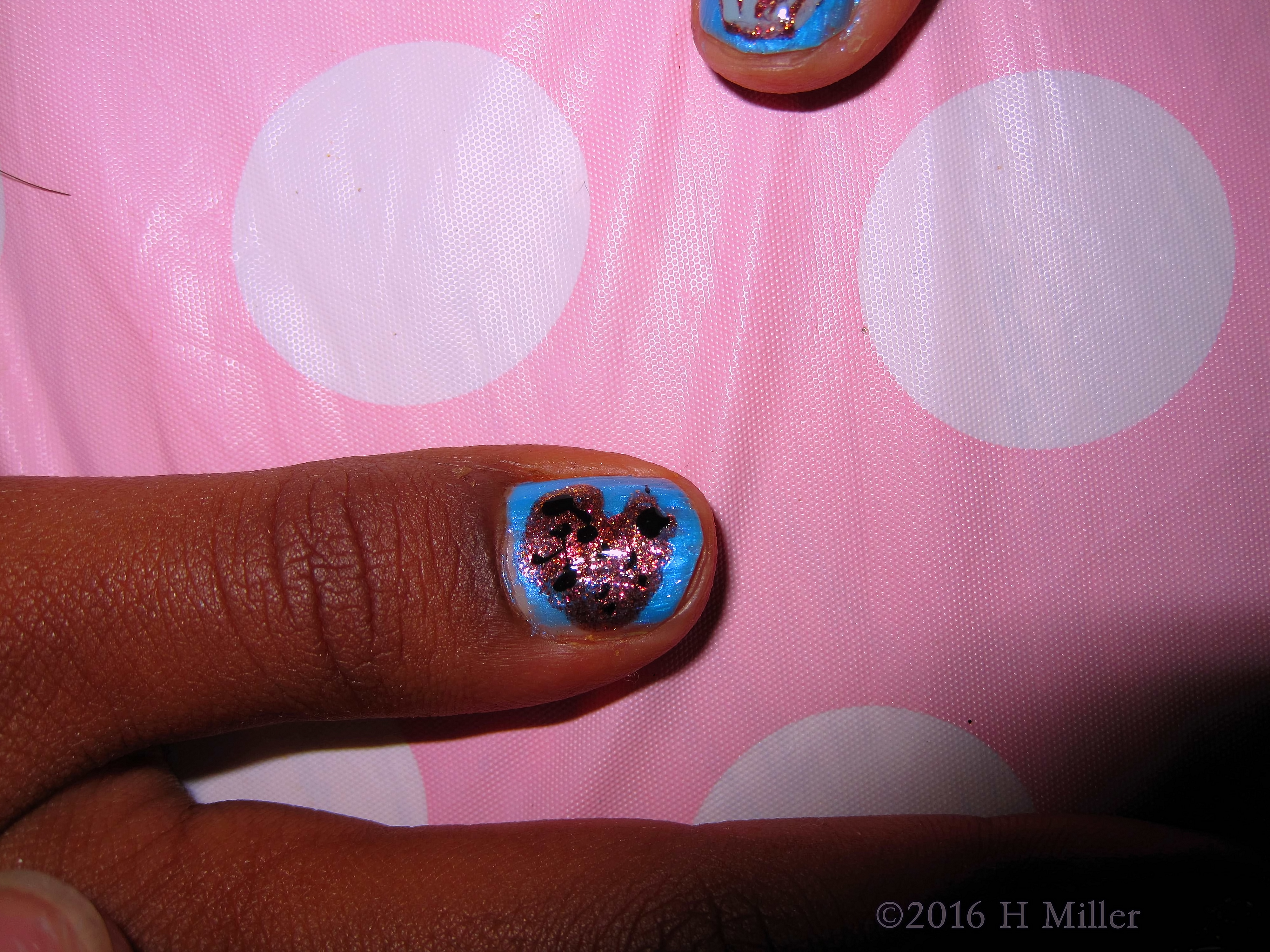 Glittery Cookie Manicure With Nail Art Design. Glittery Cookie Manicure With Nail Art Design.