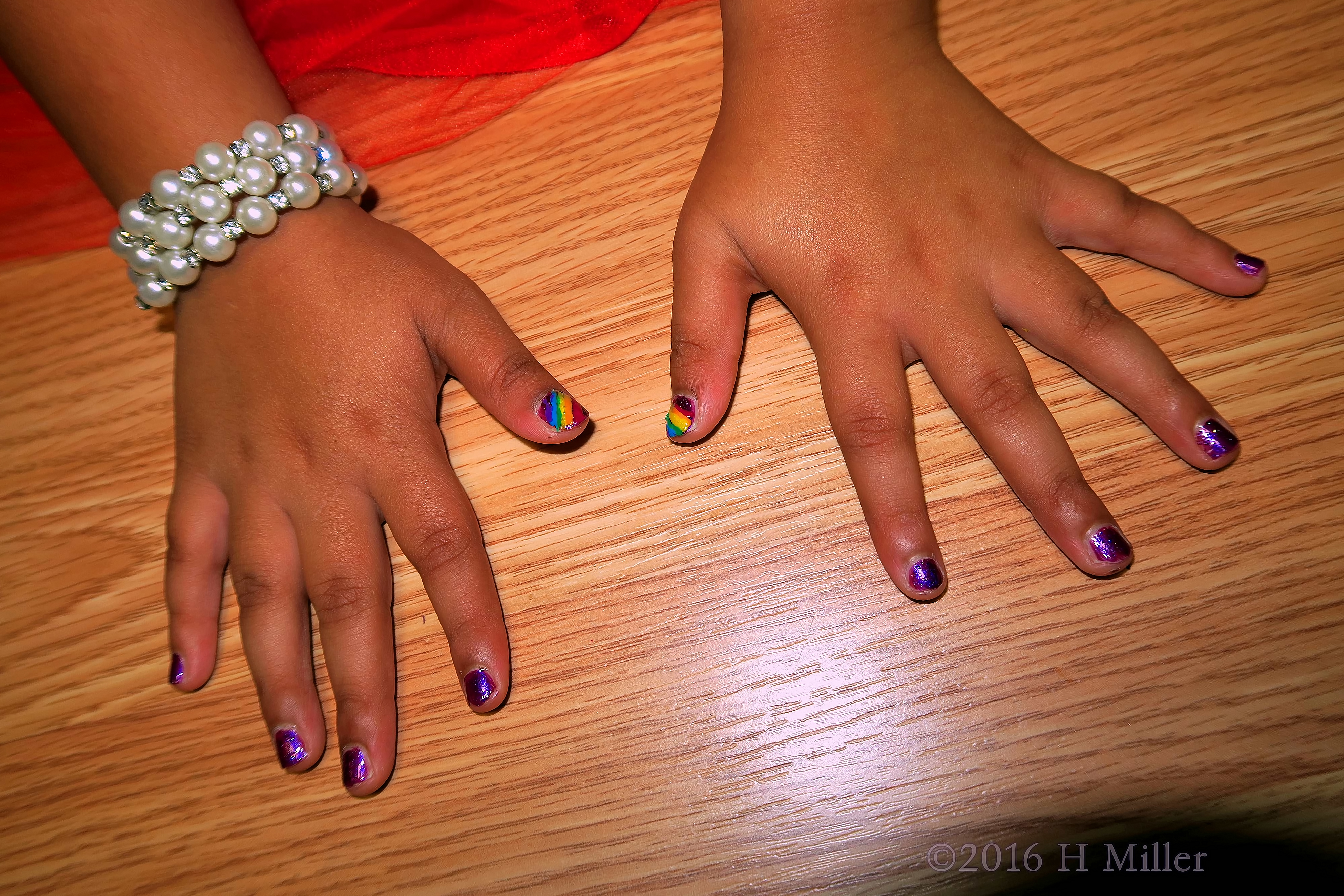Rainbow And Purple Mini Manicure Nail Art. Rainbow And Purple Mini Manicure Nail Art.