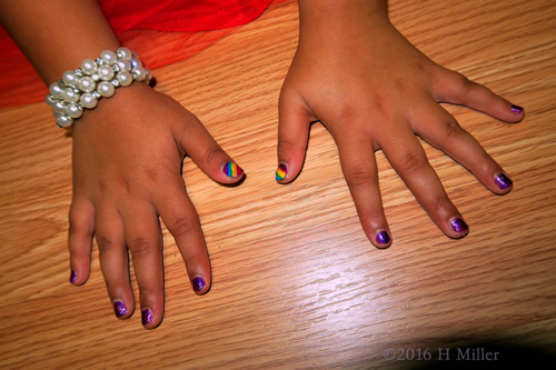 Rainbow And Purple Mini Manicure Nail Art. Rainbow And Purple Mini Manicure Nail Art.