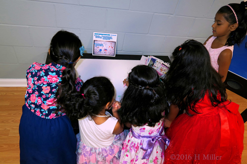 The Girls Coloring Together