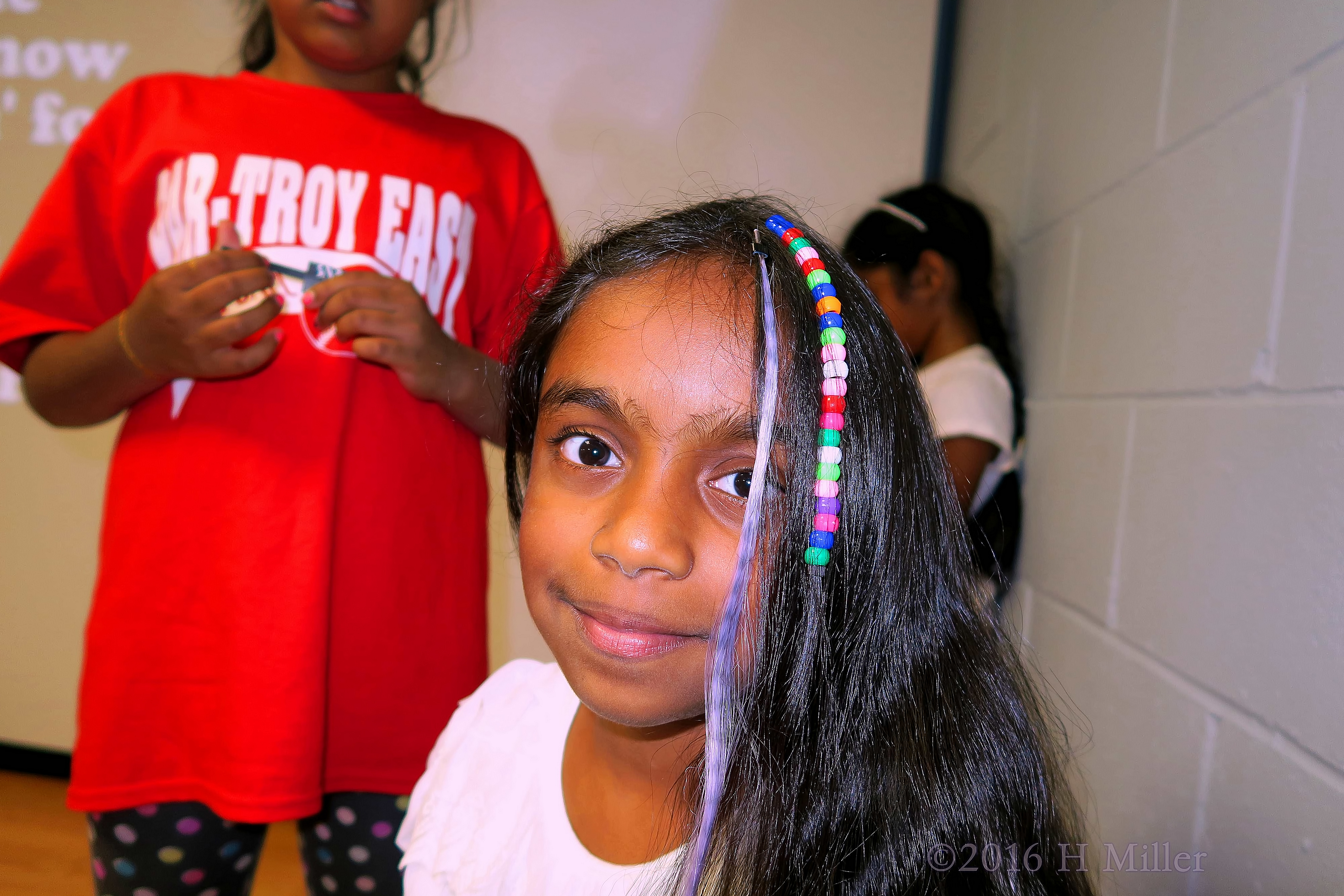 Her Rainbow And Purple Hair Extensions And Hair Feather Look Great! 