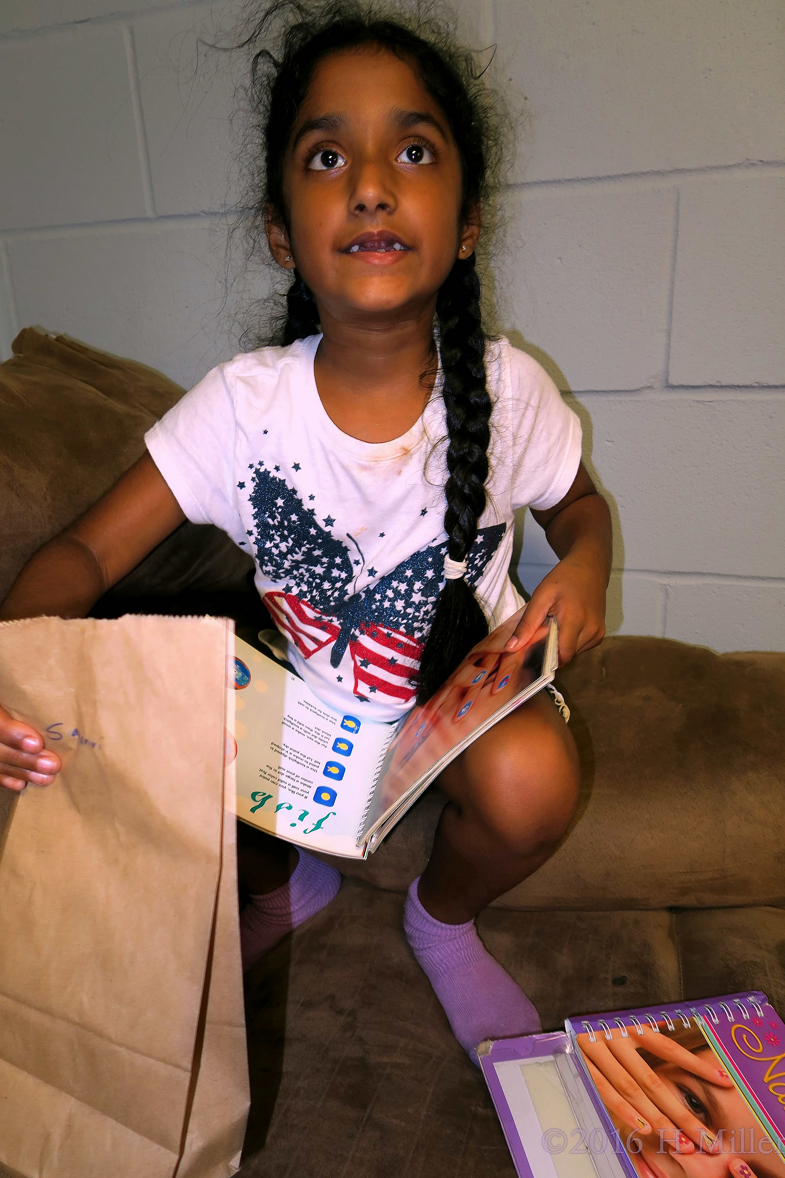 Looking At Nail Art Books On The Couch Looking At Nail Art Books On The Couch