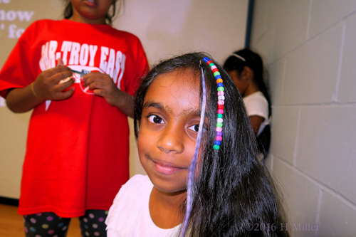 Her Rainbow And Purple Hair Extensions And Hair Feather Look Great! Her Rainbow And Purple Hair Extensions And Hair Feather Look Great!