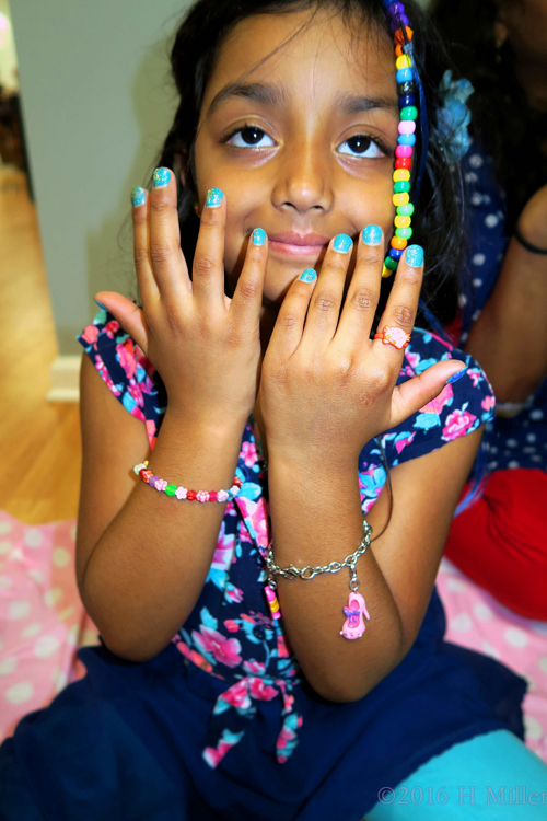 Showing Off Her Fantastic Mini Manicure For Kids!