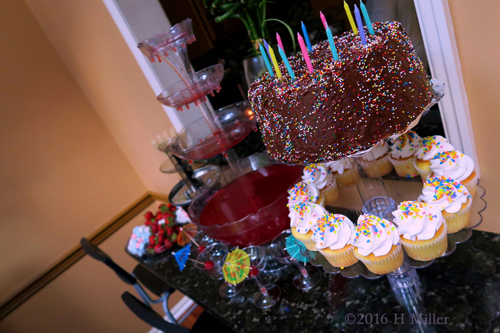 Kids Spa Party Setup With Cake And Punch Looks Delicious