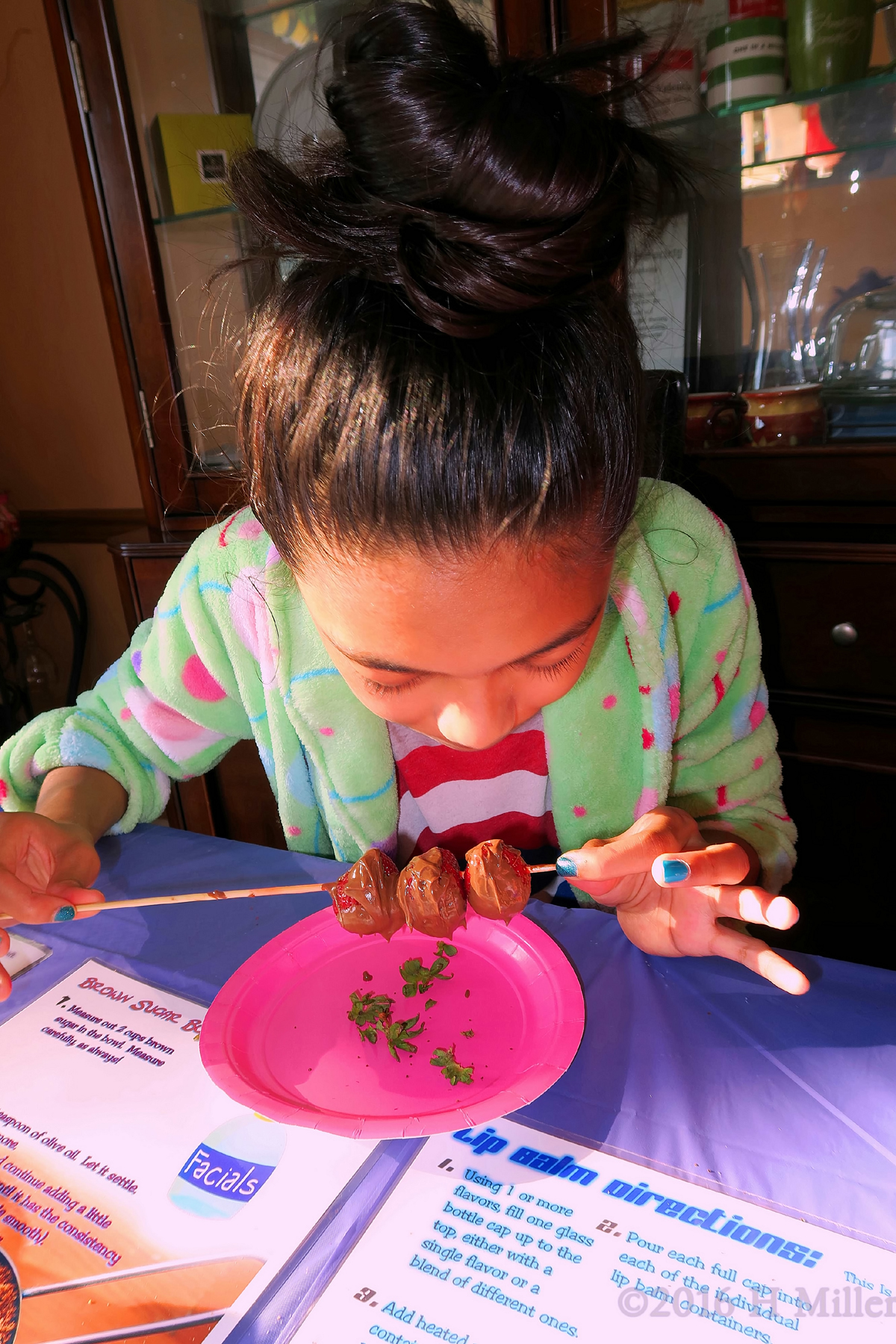 Carefully Eating Chocolate Fondue Kabobs 