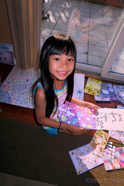 Having Fun Putting Stickers On The Spa Birthday Card Having Fun Putting Stickers On The Spa Birthday Card