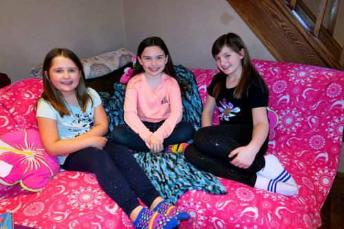 Party Guests Posing On The Spa Couches!