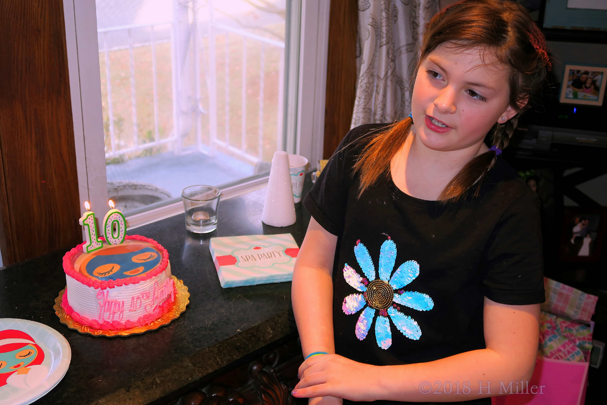 Birthday Girl With Braids Posing By Her Birthday Cake At The Kids Spa Party! 