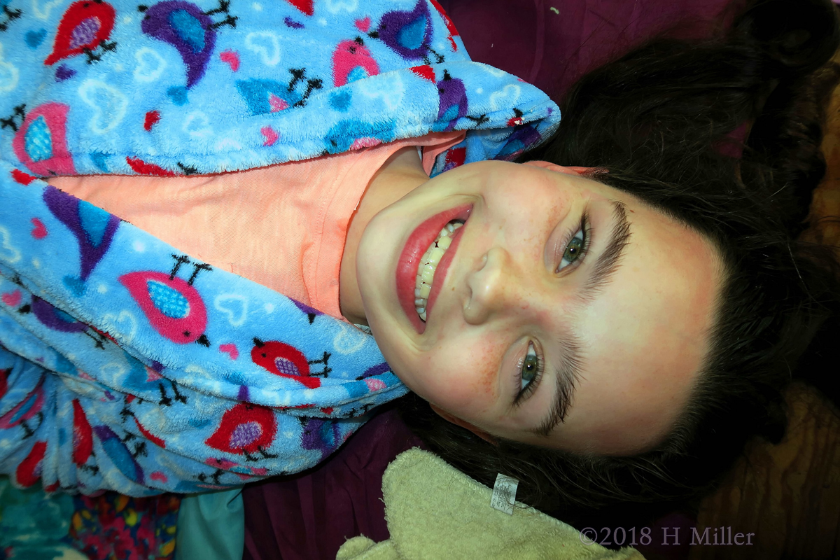 Laying Back Comfy In A Kids Spa Robe At The Kids Facial Station! 