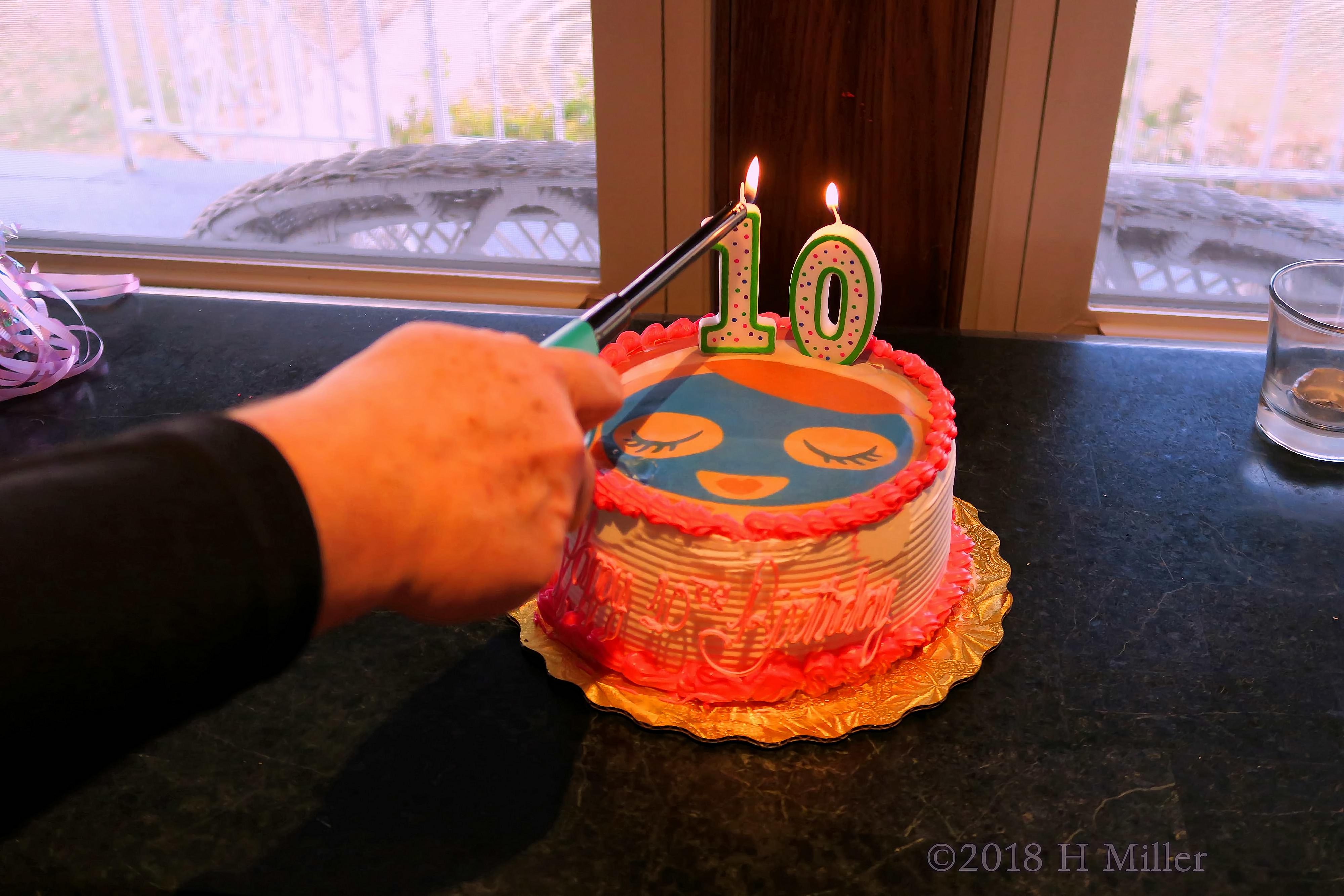 Lighting The Candles On The Kids Spa Party Birthday Cake! Lighting The Candles On The Kids Spa Party Birthday Cake!