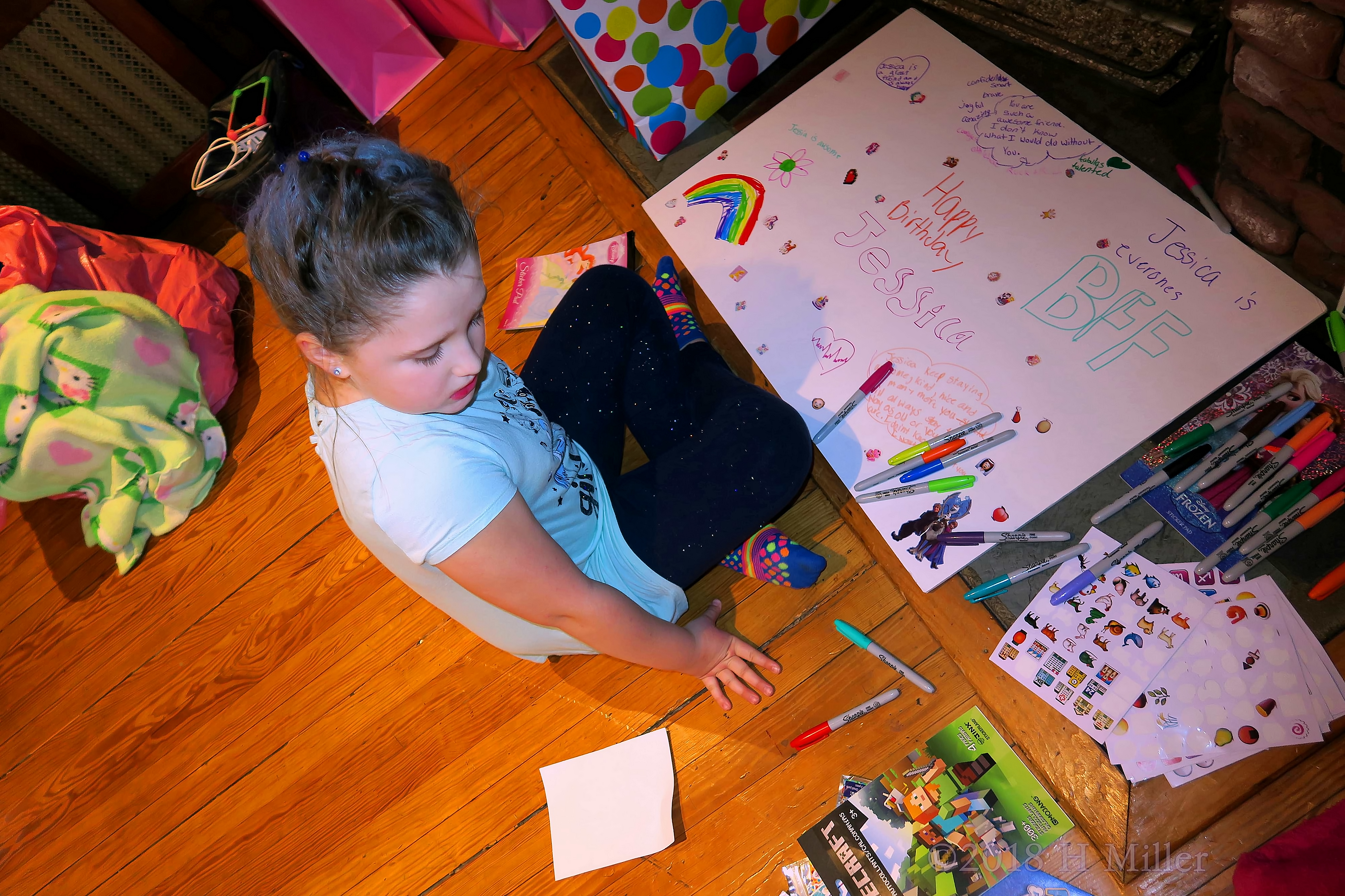 Party Guest Signing The Spa Birthday Card!