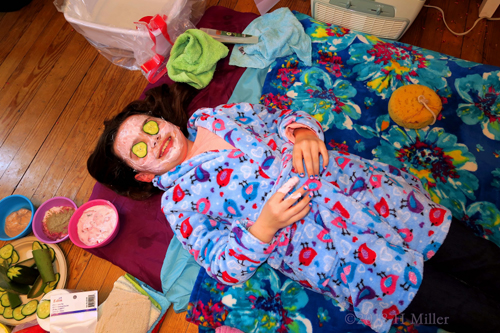 Kids Facial Mask On Party Guest, And On Her Hand, Too Kids Facial Mask On Party Guest, And On Her Hand, Too