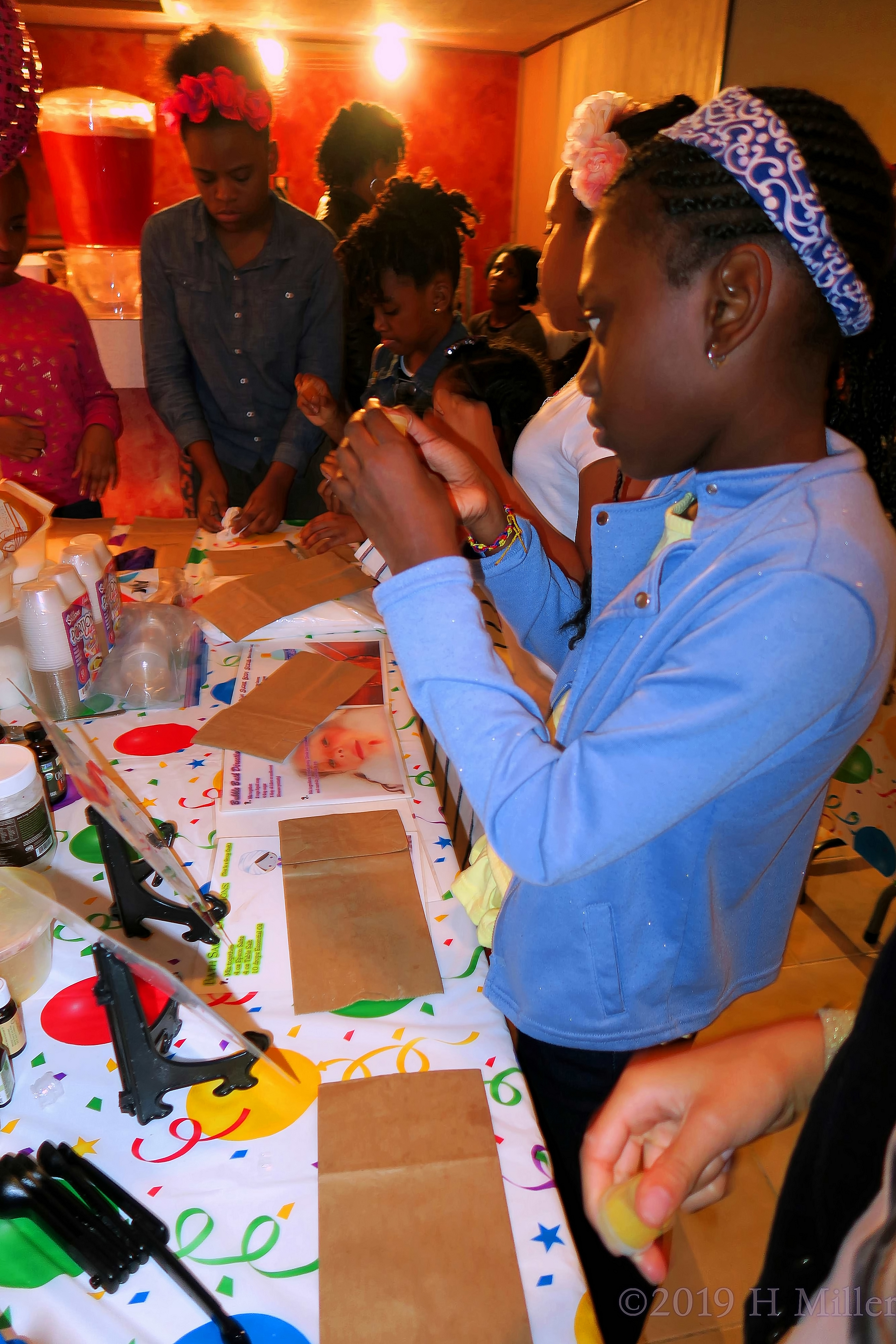 The Birthday Girl And Her Friends Making Crafts For Kids. The Birthday Girl And Her Friends Making Crafts For Kids.