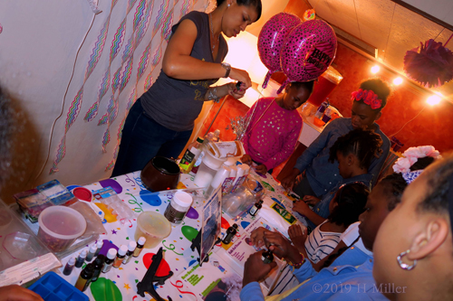 Party Guests Gathered At The Craft For Kids Station