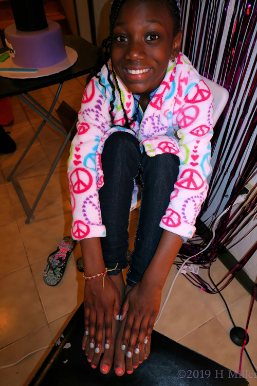 A Happy Girl With Her Pretty Mini Mani And Mini Pedi. A Happy Girl With Her Pretty Mini Mani And Mini Pedi.