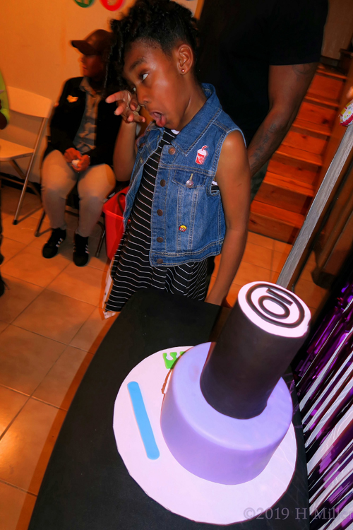 Birthday Girl Getting Ready To Cut Her Cake