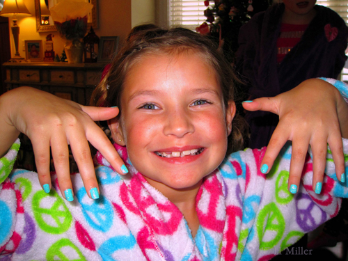 Smiling Big With Her Mini Mani