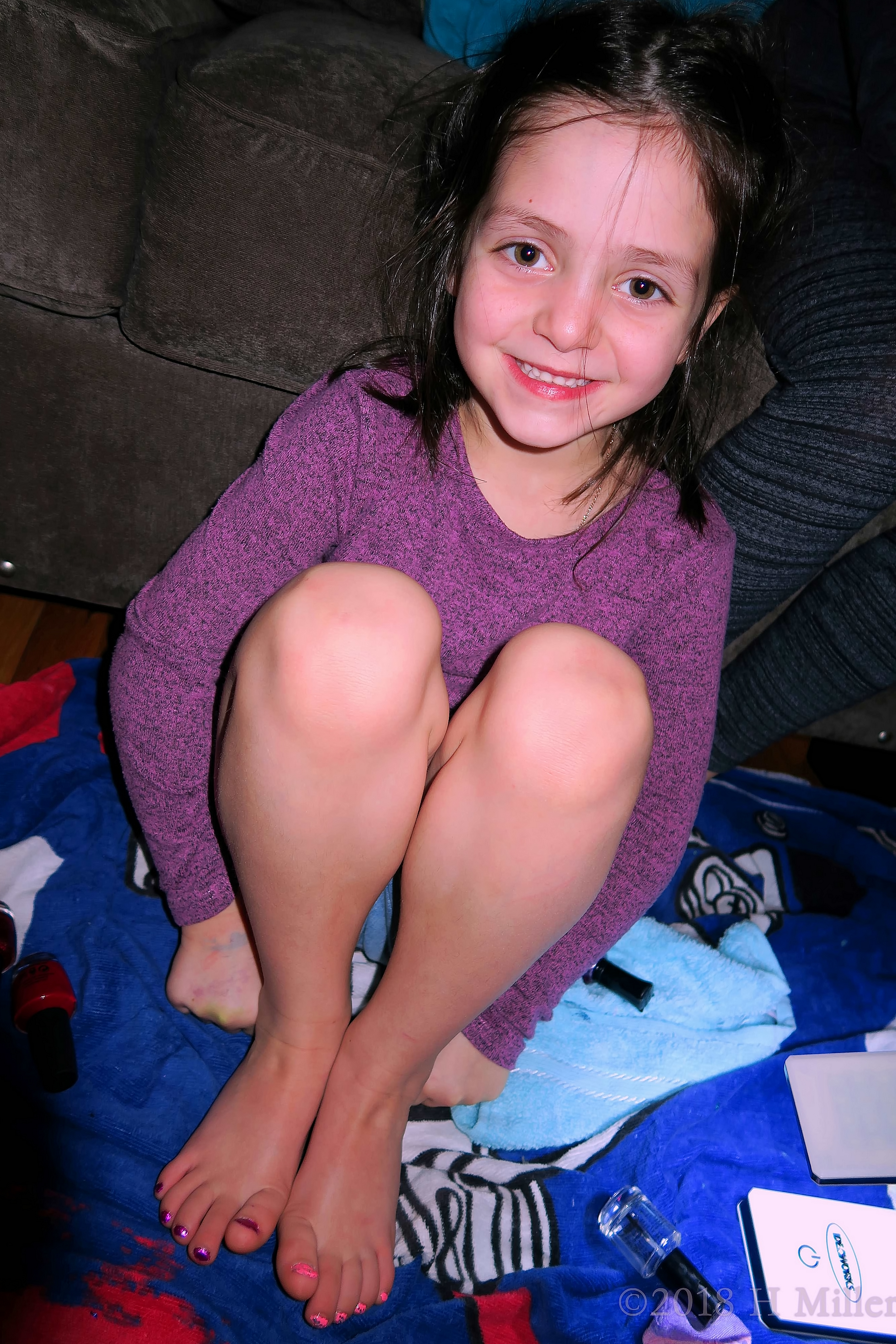 Party Guest Poses With Purple And Pink Polish On Kids Pedicure! 