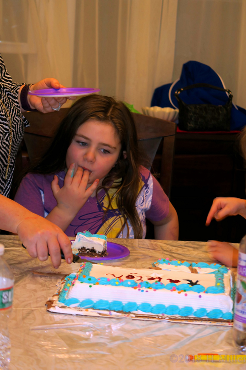 Finger Licking Good! Party Guests Cut Into The Kids Spa Party Birthday Cake!