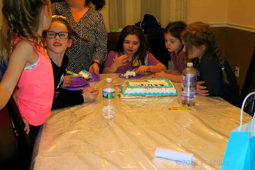 Let Them Eat Cake! Party Guests Gather Around The Table!