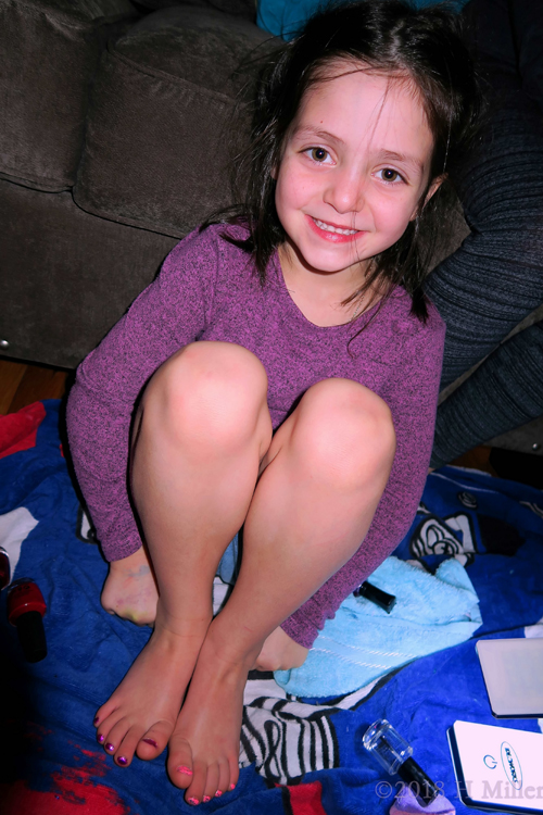 Party Guest Poses With Purple And Pink Polish On Kids Pedicure!