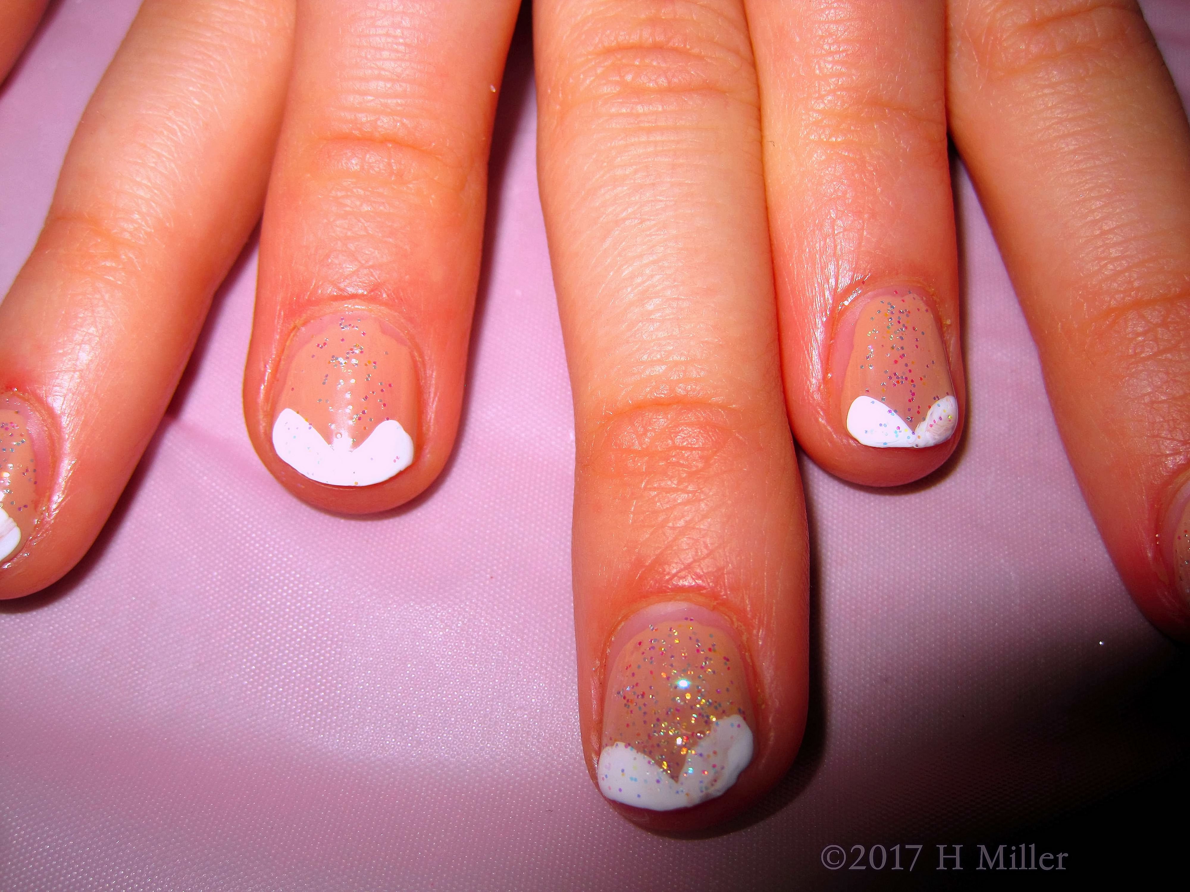 A Close View Of The French Manicure Nail Design For This Kids Manicure With Glitter! A Close View Of The French Manicure Nail Design For This Kids Manicure With Glitter!