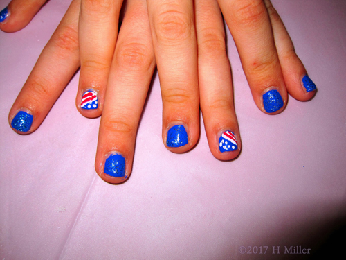 Bright Red White And Blue American Flag Nail Design With Glittery Blue Polish For This Girls Manicure