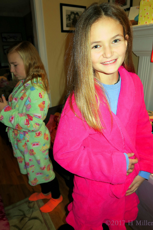 Happy Party Guest In Her Pink Spa Robe 