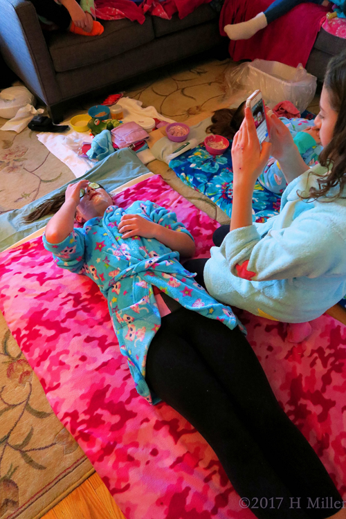 She Is Taking A Picture Of Her Friend Having A Facial For Girls! 