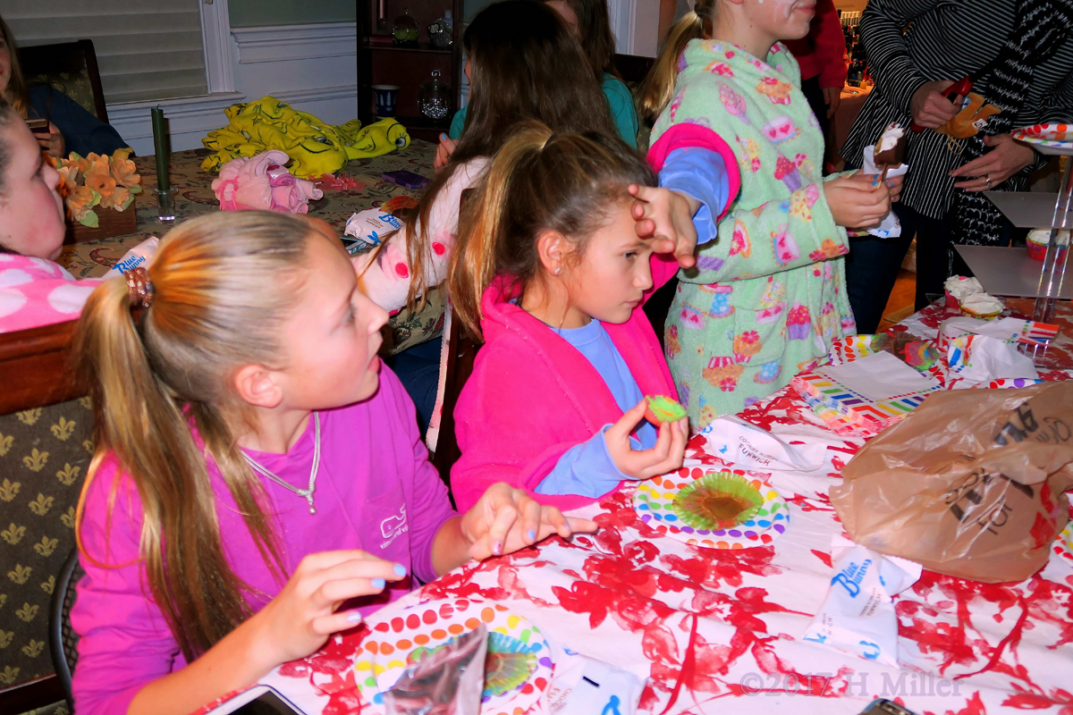 Busy Girls Having Cupcakes At Kate's Spa Birthday Party 