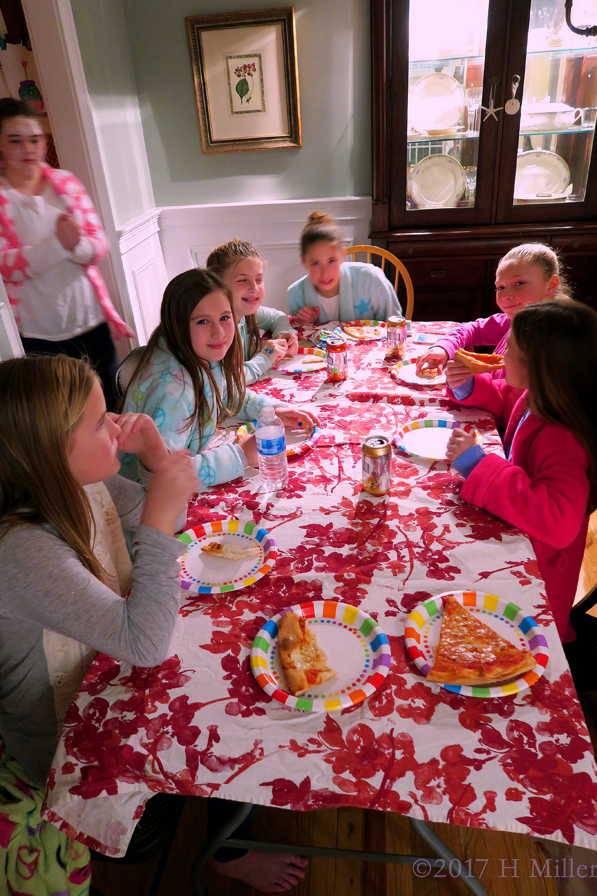 Friends Are At The Dining Table Having Snacks