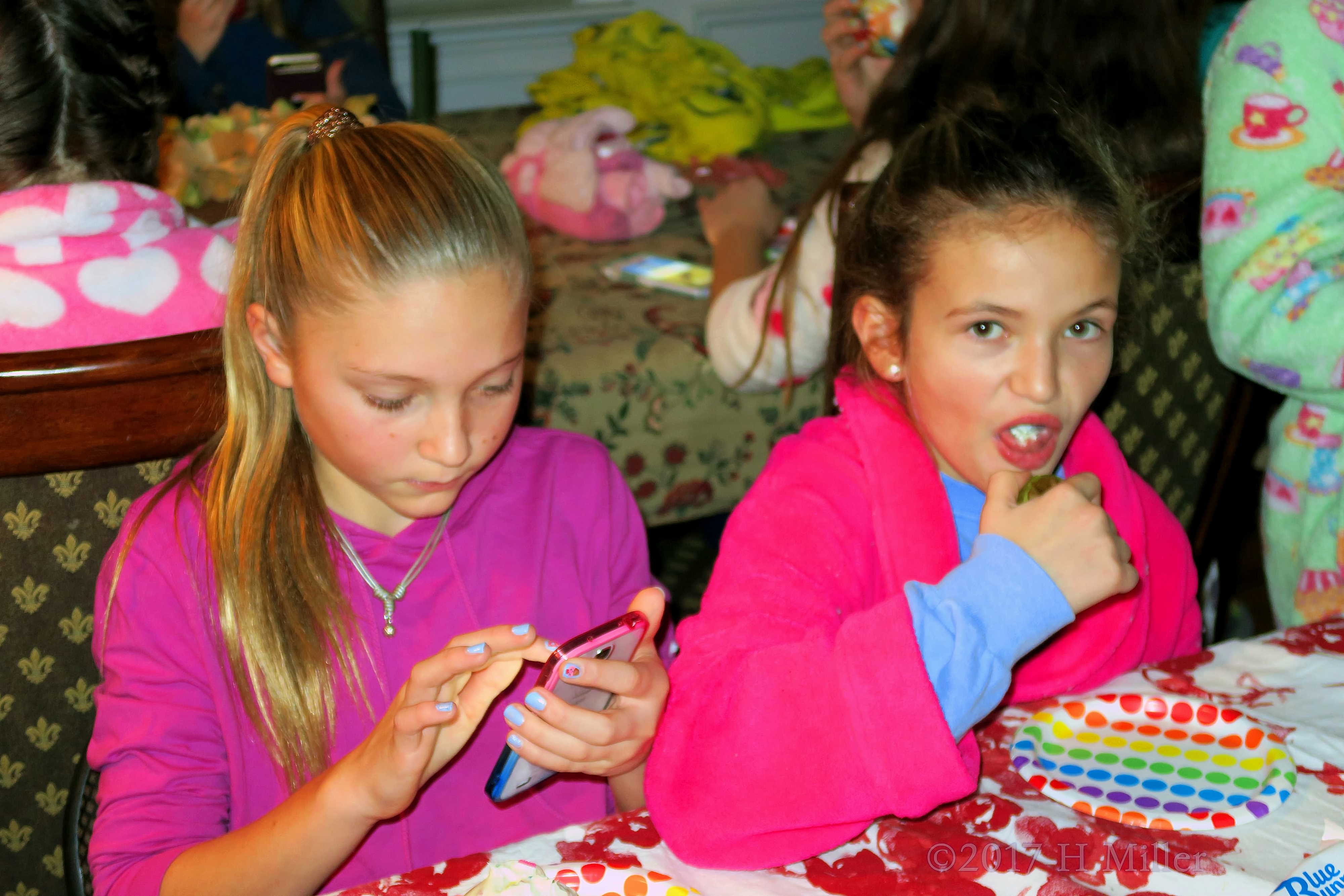 She Is Checking Her Phone Before Having Snacks She Is Checking Her Phone Before Having Snacks