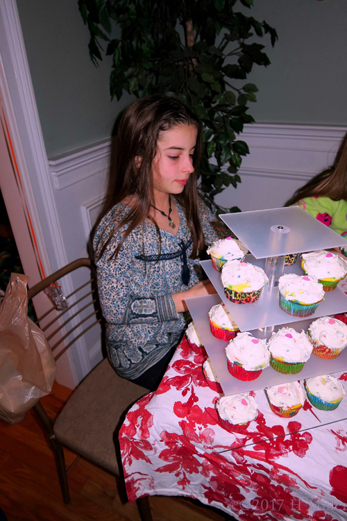 Birthday Girl Is Serving The Cupcakes