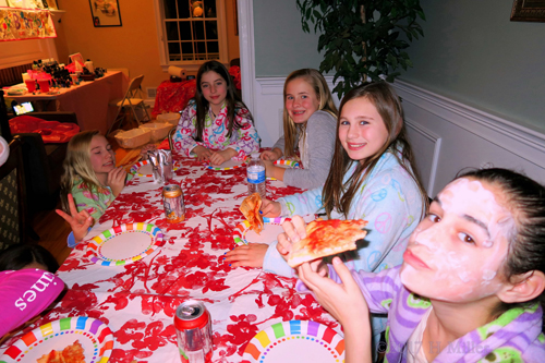 Birthday Girl With Her Friends At The Dining Table