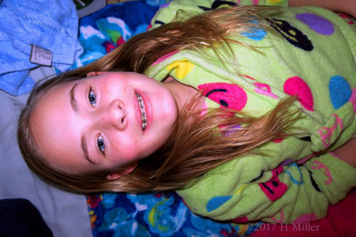 Party Guest Wearing A Yellow Smiley Spa Robe, About To Get A Kids Facial! Party Guest Wearing A Yellow Smiley Spa Robe, About To Get A Kids Facial!