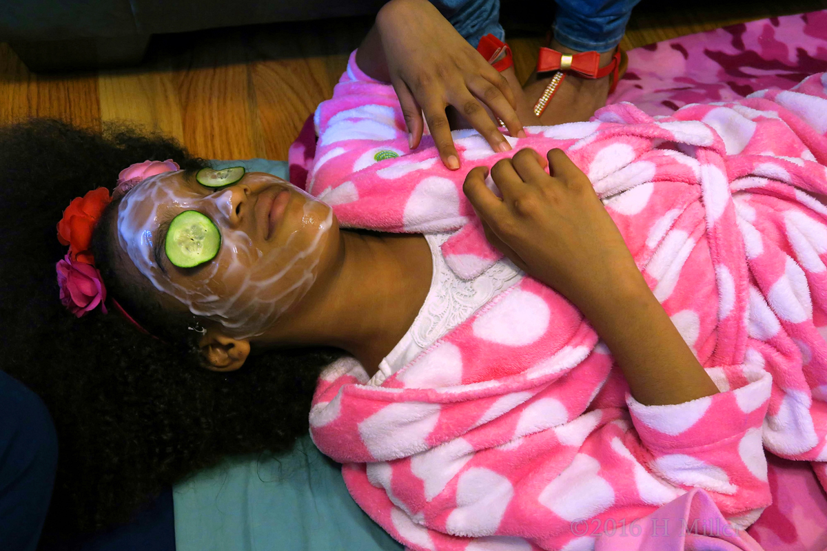 Another View Of The Birthday Girl Relaxing With Her Kids Facial Masque On. 