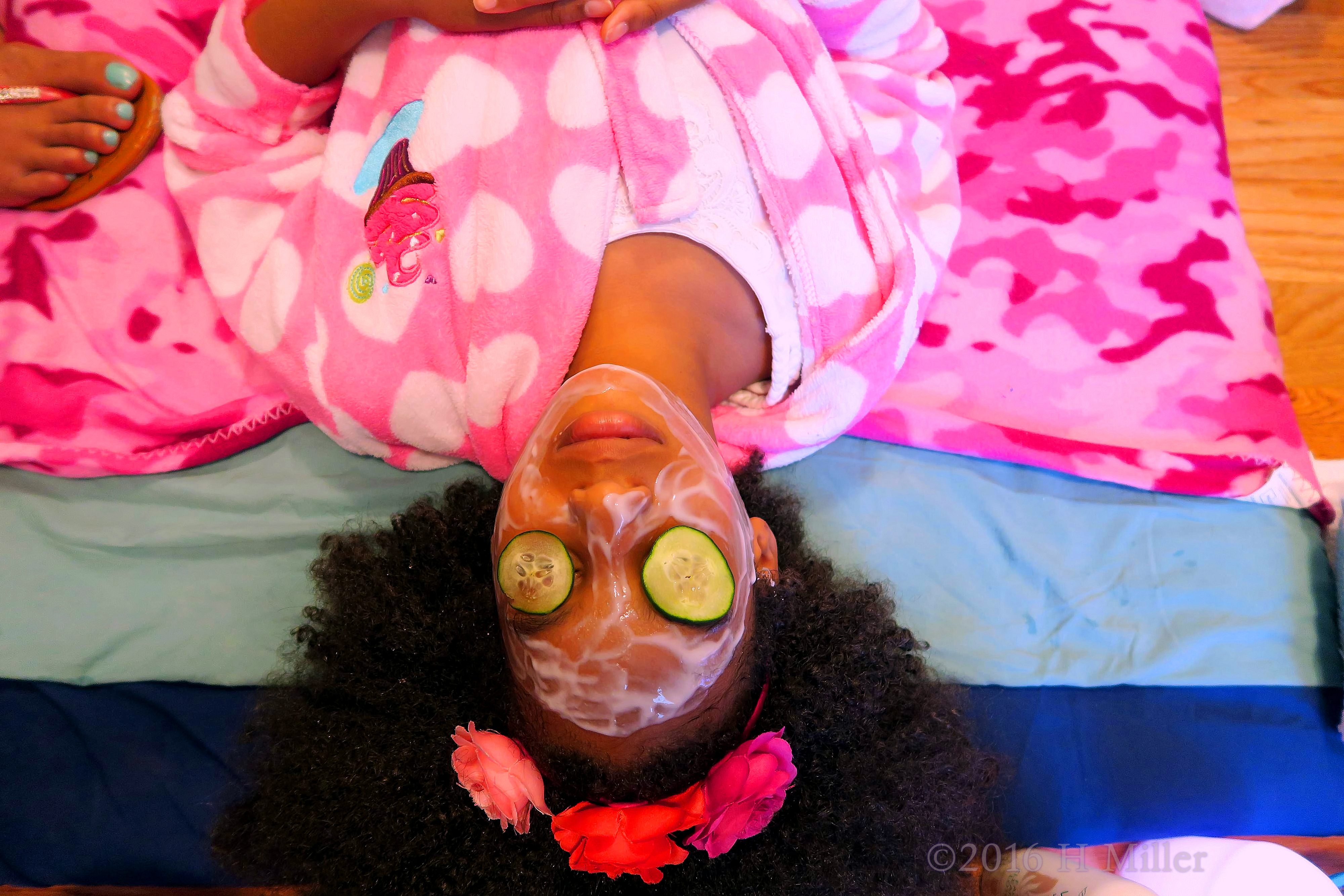 Relaxing With Cukes On Her Eyes During Kids Facials! 