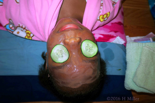 Cukes On Her Eyes And Kids Facial Masque Applied!