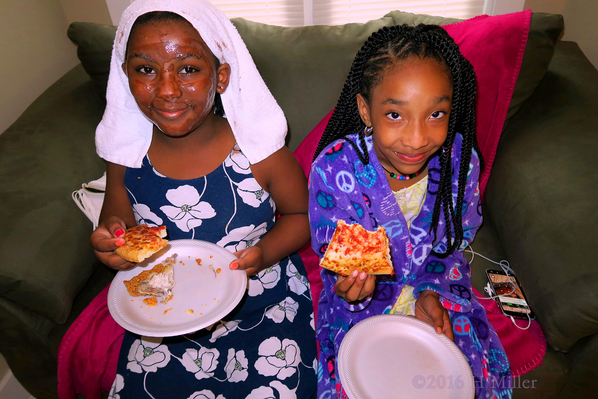 Smiling While Eating Their Pizza Together! 