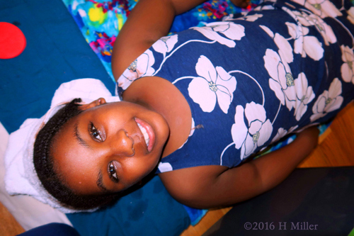 Her Kids Facial Treatment Is About To Be Received And She Is Smiling! Her Kids Facial Treatment Is About To Be Received And She Is Smiling!