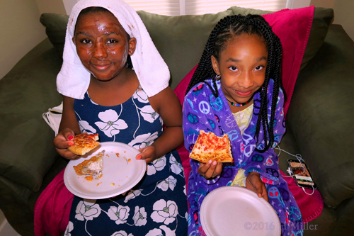 Smiling While Eating Their Pizza Together!