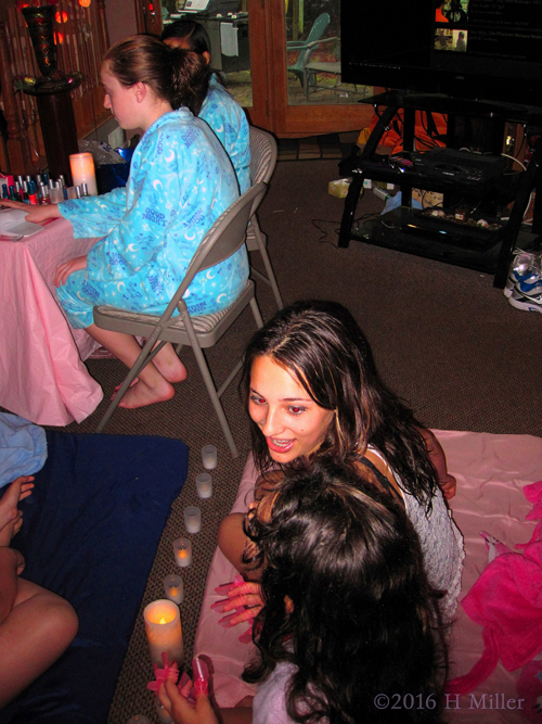 Chatting In The Kids Facials And Massage Area