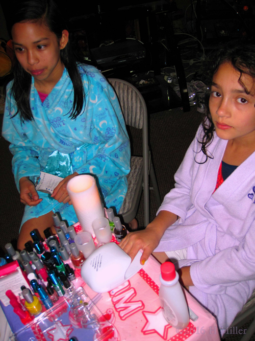Drying Her Kids Manicure At The Girls Spa Party Drying Her Kids Manicure At The Girls Spa Party