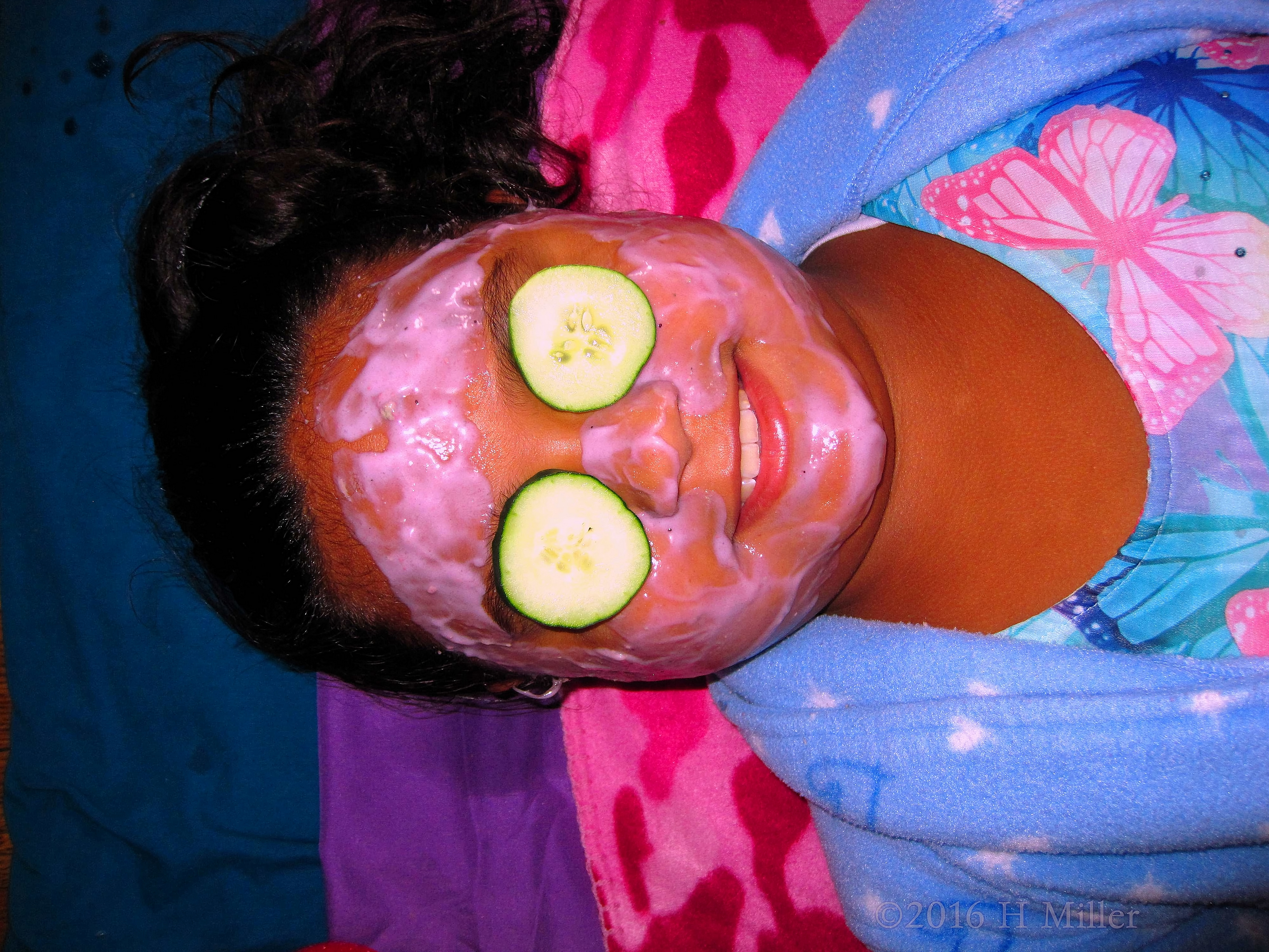 Enjoying Her Kids Facial Activity At The Spa Party For Girls! 