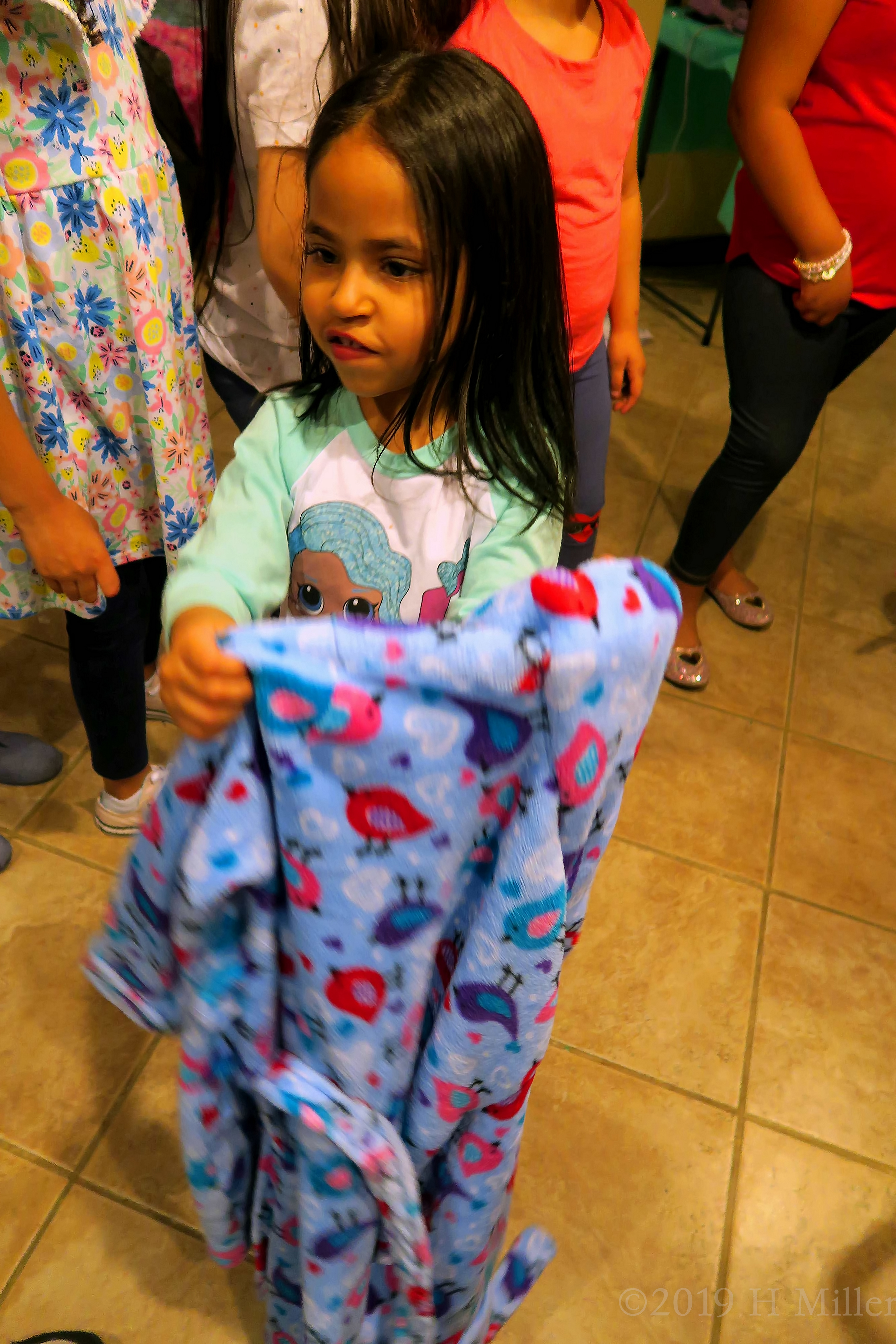 Party Guest Holding Spa Robe At The Birthday Party 4