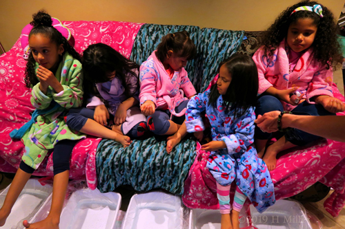 A Bunch Of Party Guests Enjoying Kids Pedicures! 