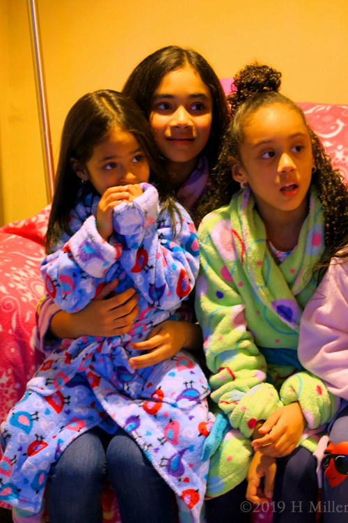 Girls Wearing Vibrant And Colorful Spa Robes 